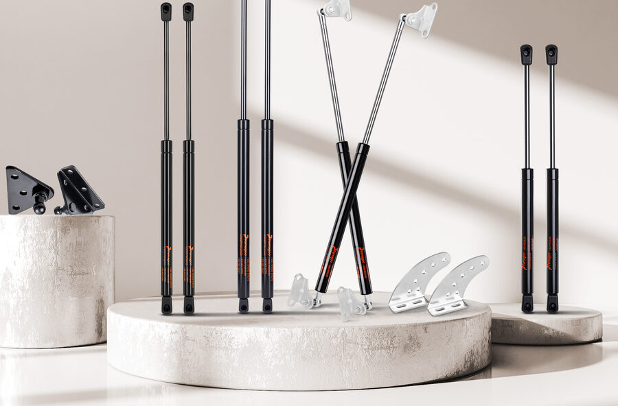 An array of PAMAGOO gas struts and mounting hardware in a bright studio